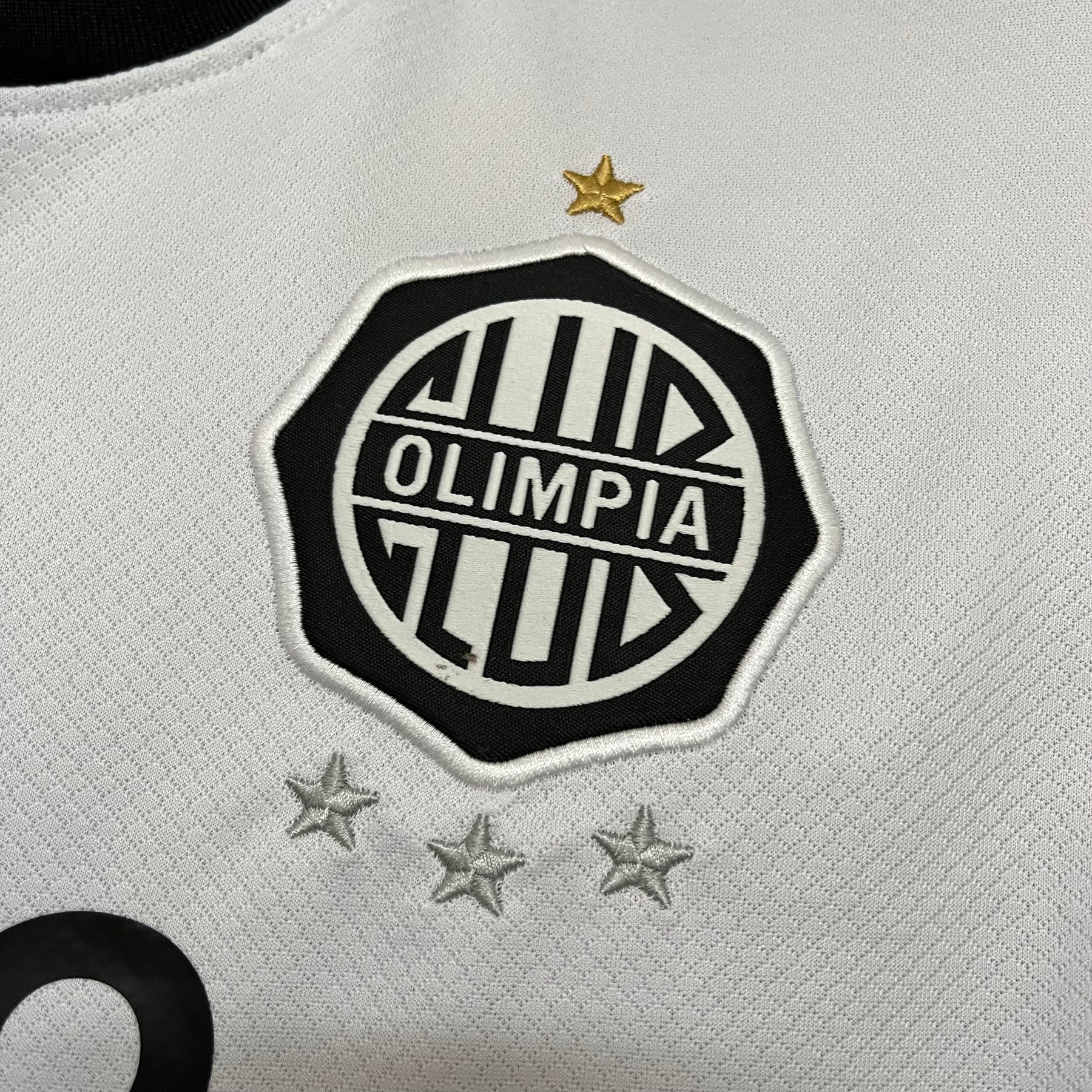 CAMISA OLIMPIA HOME 25/26